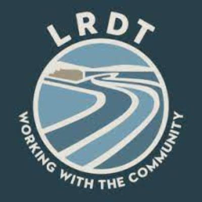 LRDT logo, graphic image of Lyme Regis Cobb on blue background